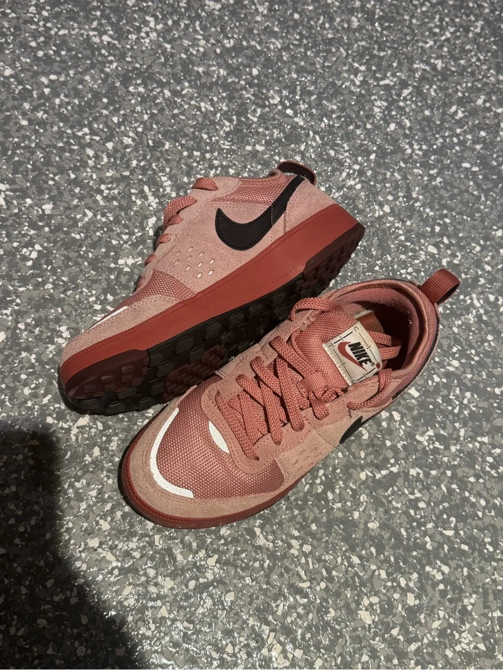Nike Women's Rose Pink Low-Top Sneakers with Black Swoosh